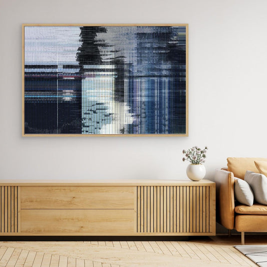 Abstract art piece on a wall above a wooden console table in a living room for sale