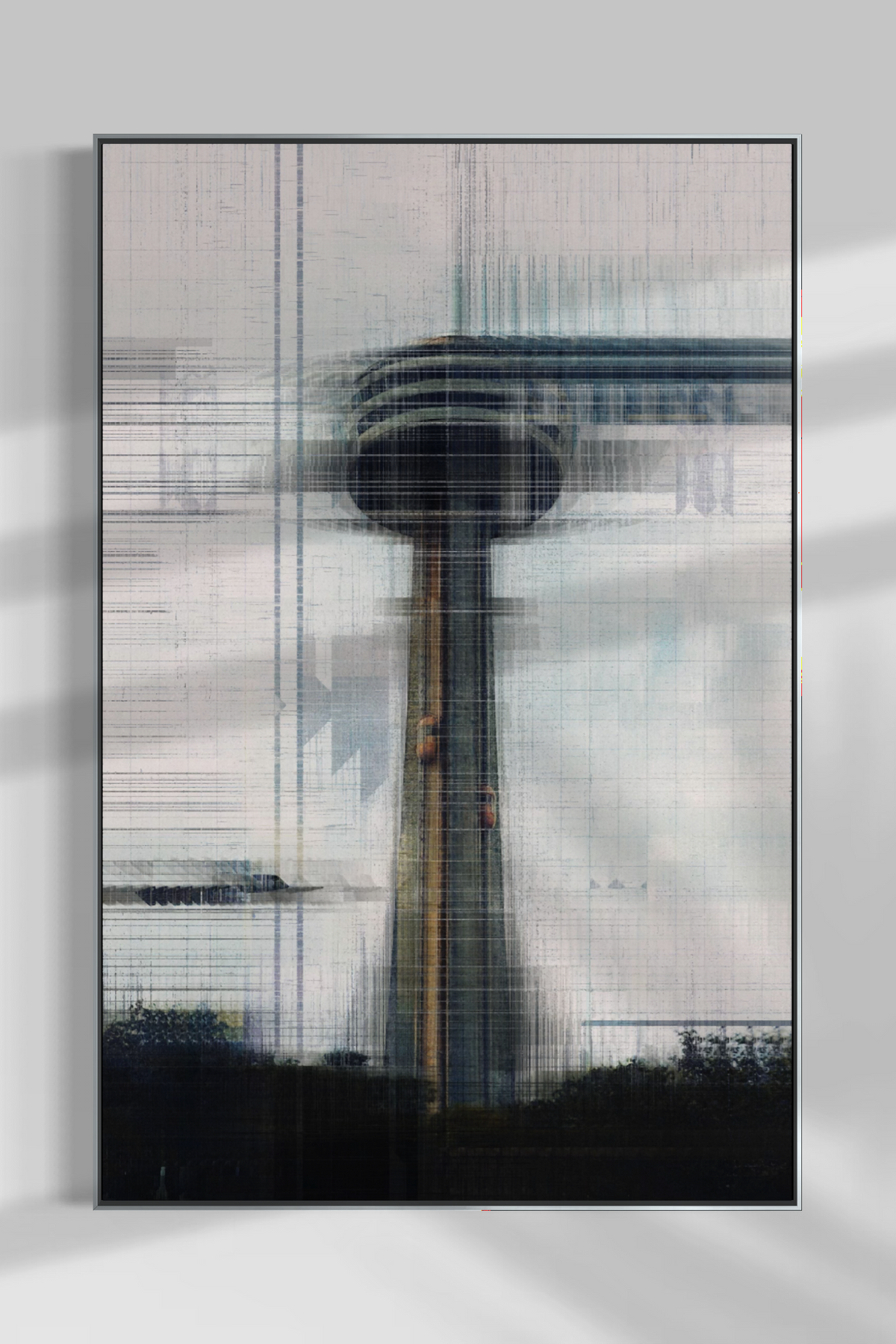 A framed abstract art print featuring a stylized, glitch-effect depiction of the Montreal Tower, displayed on a light gray wall with soft shadows.