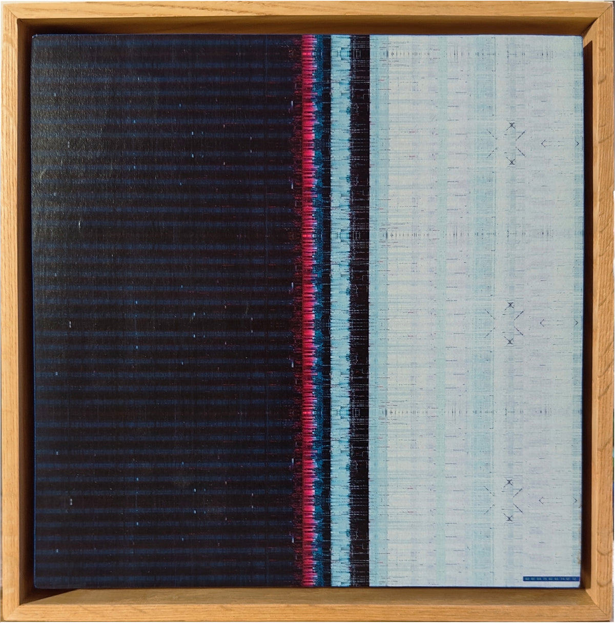 A square framed textile artwork or panel with a woven pattern, shown flat against a light neutral background. The design is split vertically into a dark navy/black striped section on the left and a pale blue/white section on the right, with narrow vertical bands of red, pink, black, and light blue in the center.