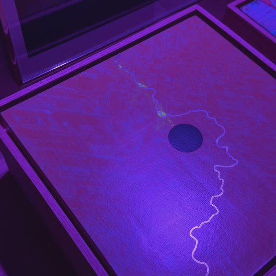 Video of the glitched artwork under a black light